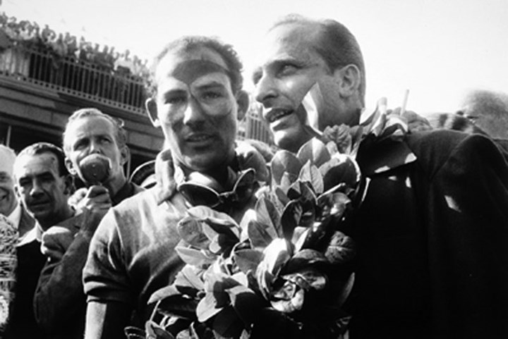 Stirling Moss and Juan Manuel Fangio 1955 British GP  - click to enlarge
