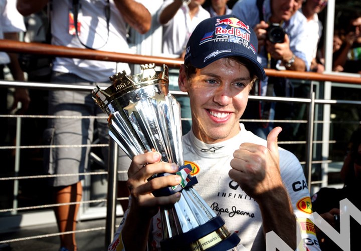 Sebastian Vettel with trophy Monza 2011 - click to enlarge
