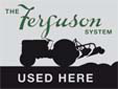The Ferguson System Metal Sign