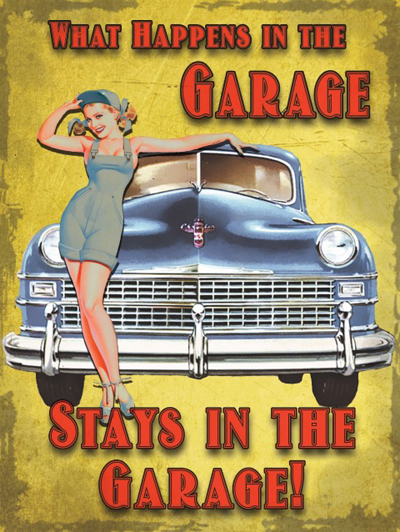 What Happens in the Garage Metal Sign