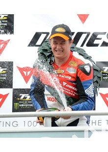 John McGuinness TT 2011 Superbike Race Champagne