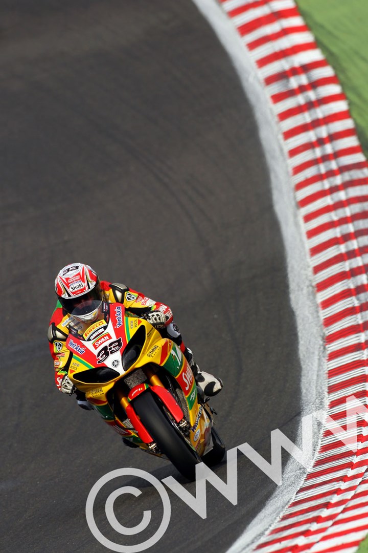 Tommy Hill  BSB 2011 Exiting paddock Hill Bend - click to enlarge