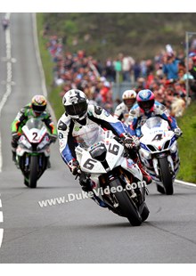 Michael Dunlop leads the pack in to Creg-ny-Baa