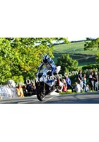 Michael Dunlop jumps Ballaugh Bridge.