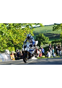 Michael Dunlop jumps Ballaugh Bridge.