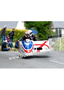 TT 2014 Conrad Harrison and Mike Aylott jumping at Ballaugh