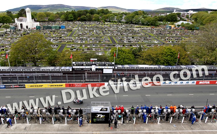 Bruce Anstey crosses the line Superbike Race TT 2015 - click to enlarge