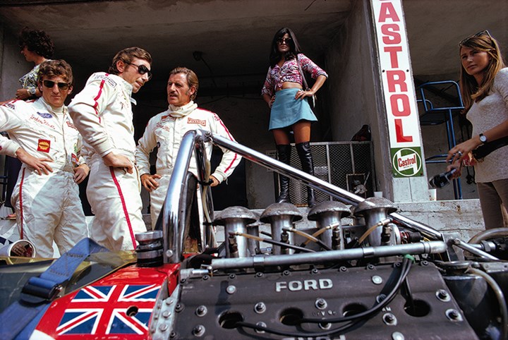 1969 Italian GP, Rindt ,Siffert and  Hill in pits Print